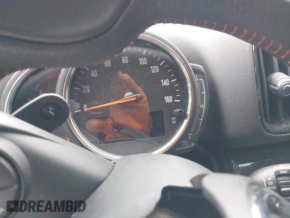 2020 MINI Countryman Cooper S with VIN WMZYX1C09L3L58197, listed as a IAAI auction lot 42303609 with 6 mi miles and . Bid and sale history available at DreamBid. Image 7.