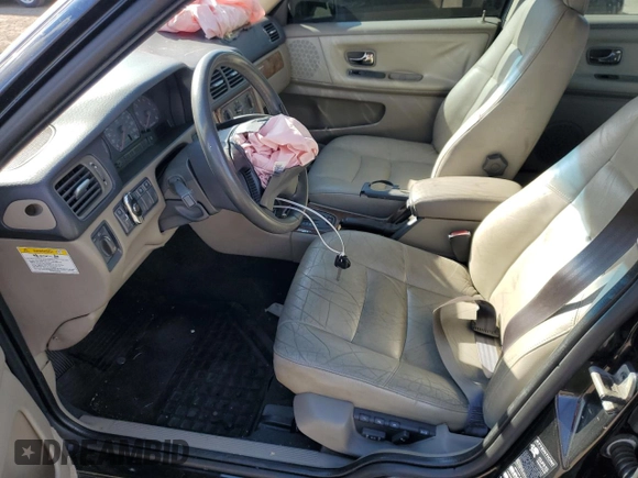 1998 Volvo S70 z VIN YV1LS5340W1425573, wystawiony jako Copart lot #75317244 z przebiegiem 403 370 mil mil oraz Szkoda całkowita • Salvage title. Historia ofert i sprzedaży dostępna na DreamBid. Obrazek 7.