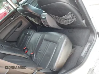 2010 Cadillac SRX Premium Collection with VIN 3GYFNFEY2AS528611, listed as a IAAI auction lot 42770194 with 213,366 mi miles and . Bid and sale history available at DreamBid. Image 8.