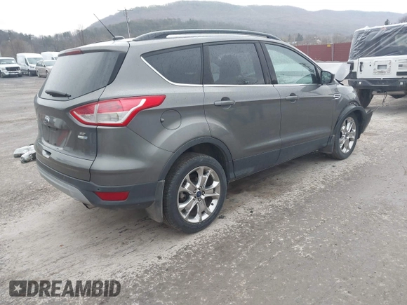 2014 Ford Escape SE with VIN 1FMCU9G9XEUB25240, listed as a IAAI auction lot 41936183 with 60,389 mi miles. Bid and sale history available at carsss.com. Image 4.