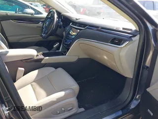 2017 Cadillac XTS Luxury with VIN 2G61M5S35H9139736, listed as a IAAI auction lot 41416683 with 119,907 mi miles. Bid and sale history available at carsss.com. Image 5.