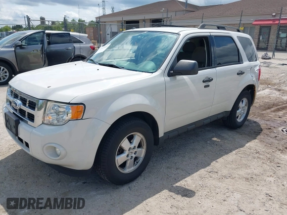 2012 Ford Escape XLT z VIN 1FMCU9DG2CKB18584, wystawiony jako IAAI lot #42469881 z przebiegiem 166 469 mil mil oraz . Historia ofert i sprzedaży dostępna na DreamBid. Obrazek 17.