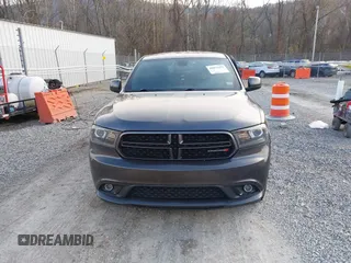 2015 Dodge Durango SXT with VIN 1C4RDJAG4FC784865, listed as a IAAI auction lot 40872452 with 145,877 mi miles and . Bid and sale history available at carsss.com. Image 12.