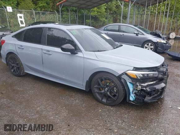 2024 Honda Civic Si z VIN 2HGFE1E52RH471891, wystawiony jako IAAI lot #40477222 z przebiegiem 23 170 mil mil oraz . Historia ofert i sprzedaży dostępna na DreamBid. Obrazek 1.