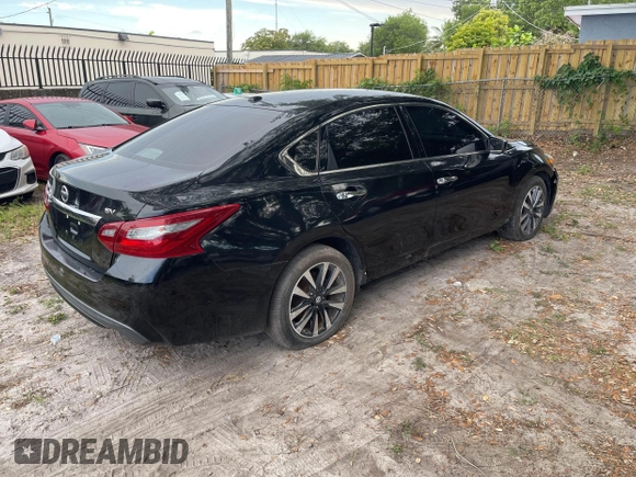 2018 Nissan Altima S with VIN 1N4AL3APXJC195152, listed as a IAAI auction lot 42196836 with 159,552 mi miles and . Bid and sale history available at DreamBid. Image 4.