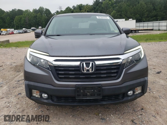 2017 Honda Ridgeline RTL-T with VIN 5FPYK3F65HB027242, listed as a Copart auction lot 62584355 with 43,165 mi miles and Salvage title. Bid and sale history available at DreamBid. Image 5.