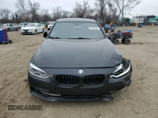 2017 BMW 3 Series 330e iPerformance with VIN WBA8E1C58HK895185, listed as a Copart auction lot 49287055 with 61,391 mi miles and Salvage Title. Bid and sale history available at carsss.com. Image 5.