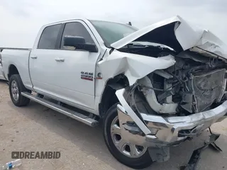 2014 Ram 2500 Big Horn with VIN 3C6UR5DL3EG148050, listed as a IAAI auction lot 42292501 with 293,477 mi miles and . Bid and sale history available at DreamBid. Image 1.