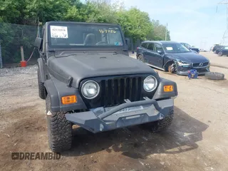 1999 Jeep Wrangler SE z VIN 1J4FY29P3XP469786, wystawiony jako IAAI lot #42131018 z przebiegiem 130 918 mil mil oraz . Historia ofert i sprzedaży dostępna na DreamBid. Obrazek 6.