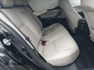 2019 Mazda 3 w/Select with VIN 3MZBPAAL4KM108590, listed as a IAAI auction lot 41726873 with 90,257 mi miles and . Bid and sale history available at carsss.com. Image 8.
