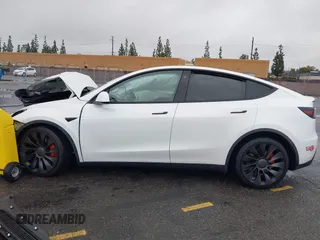 2022 Tesla Model Y Performance with VIN 7SAYGDEFXNF384268, listed as a IAAI auction lot 41558359 with 33,870 mi miles and . Bid and sale history available at DreamBid. Image 13.
