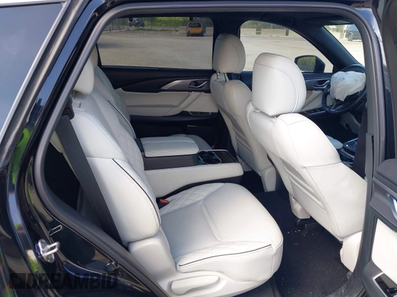 2021 Mazda CX-9 Signature with VIN JM3TCBEY1M0539786, listed as a IAAI auction lot 42264611 with 51,168 mi miles and . Bid and sale history available at DreamBid. Image 8.