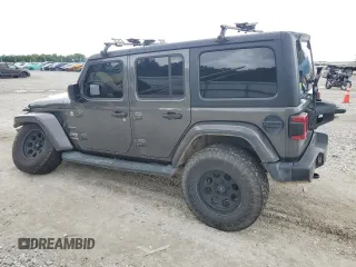 2018 Jeep Wrangler Unlimited Sahara с VIN 1C4HJXEG0JW308332, выставлен на аукционе Copart как лот 58778355 с пробегом 90 384 миль миль и Списание • Salvage title. История ставок и продаж доступна на DreamBid. Изображение 2.