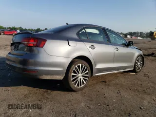 2016 Volkswagen Jetta Sport z VIN 3VWD17AJ3GM242719, wystawiony jako Copart lot #62234275 z przebiegiem 73 394 mil mil oraz Szkoda całkowita • Salvage title. Historia ofert i sprzedaży dostępna na DreamBid. Obrazek 3.
