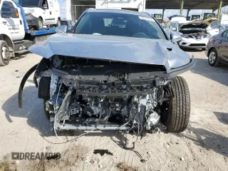 2024 Lexus RX with VIN 2T2BAMBA7RC047799, listed as a Copart auction lot 84478494 with 1,943 mi miles and Salvage Title. Bid and sale history available at carsss.com. Image 5.