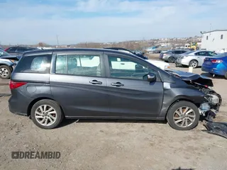 2013 Mazda 5 Sport z VIN JM1CW2BL3D0155694, wystawiony jako IAAI lot #41641169 z przebiegiem Nie podano mil oraz . Historia ofert i sprzedaży dostępna na DreamBid. Obrazek 12.