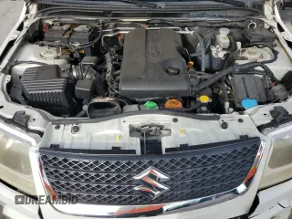 2010 Suzuki Grand Vitara Premium z VIN JS3TE0D2XA4110124, wystawiony jako Copart lot #74387914 z przebiegiem 91 106 mil mil oraz Szkoda całkowita • Salvage title. Historia ofert i sprzedaży dostępna na DreamBid. Obrazek 12.