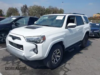 2021 Toyota 4Runner TRD Off Road Premium with VIN JTERU5JR7M5940287, listed as a IAAI auction lot 42592875 with 21,771 mi miles and . Bid and sale history available at DreamBid. Image 2.
