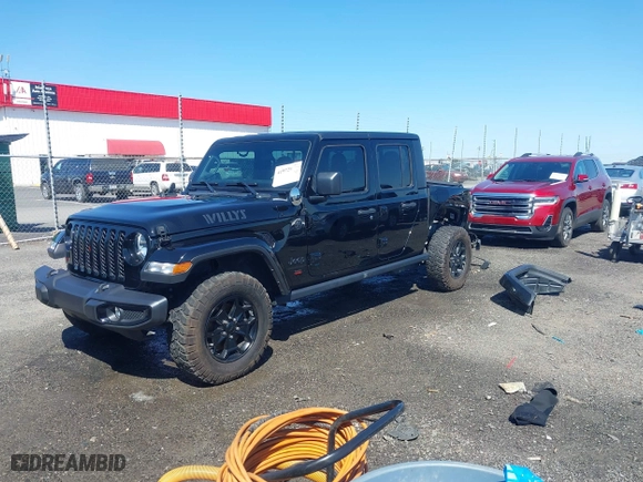 2023 Jeep Gladiator Freedom with VIN 1C6HJTAG1PL526229, listed as a IAAI auction lot 41972084 with 26,021 mi miles. Bid and sale history available at carsss.com. Image 18.