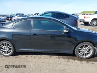 2009 Scion tC with VIN JTKDE167090284572, listed as a IAAI auction lot 41808769 with 132,474 mi miles. Bid and sale history available at carsss.com. Image 13.