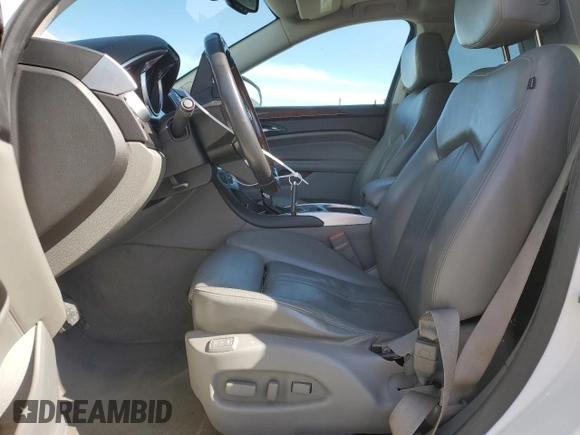 2012 Cadillac SRX Premium Collection with VIN 3GYFNFE39CS515037, listed as a Copart auction lot 55797235 with 146,778 mi miles and Salvage title. Bid and sale history available at DreamBid. Image 7.