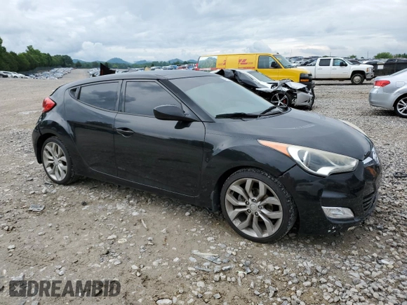 2012 Hyundai Veloster w/Black Int with VIN KMHTC6AD0CU059003, listed as a Copart auction lot 58480625 with 133,137 mi miles and Salvage title. Bid and sale history available at DreamBid. Image 4.