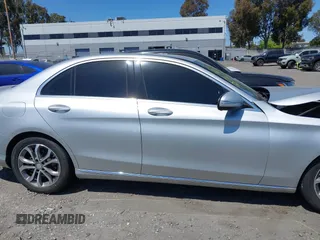 2015 Mercedes-Benz C 300 with VIN 55SWF4JB1FU077386, listed as a IAAI auction lot 42164280 with 104,452 mi miles and . Bid and sale history available at carsss.com. Image 14.