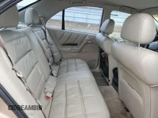 1998 Cadillac Catera z VIN W06VR52R5WR028774, wystawiony jako Copart lot #78085484 z przebiegiem 104 609 mil mil oraz Szkody całkowita. Historia ofert i sprzedaży dostępna na DreamBid. Obrazek 10.