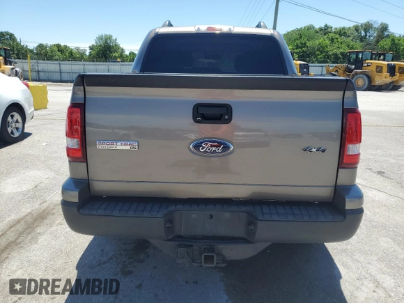 2007 Ford Explorer Sport Trac XLT z VIN 1FMEU51K87UA28537, wystawiony jako Copart lot #57344815 z przebiegiem 155 858 mil mil oraz Szkoda całkowita • Salvage title. Historia ofert i sprzedaży dostępna na DreamBid. Obrazek 6.