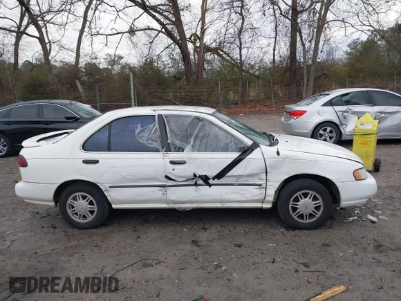 1996 Nissan Sentra XE z VIN 1N4AB41D0TC763104, wystawiony jako IAAI lot #41303640 z przebiegiem 307 682 mil mil oraz . Historia ofert i sprzedaży dostępna na DreamBid. Obrazek 13.