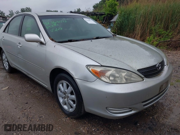 2002 Toyota Camry XLE z VIN JTDBF30K420083381, wystawiony jako IAAI lot #42368073 z przebiegiem 148 746 mil mil oraz . Historia ofert i sprzedaży dostępna na DreamBid. Obrazek 6.