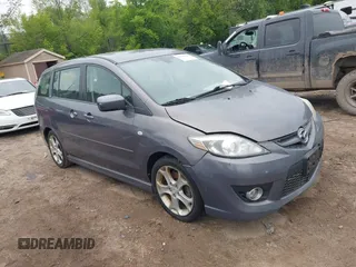 2009 Mazda 5 Grand Touring with VIN JM1CR293190358720, listed as a IAAI auction lot 42352984 with 184,580 mi miles and . Bid and sale history available at DreamBid. Image 1.