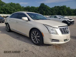 2013 Cadillac XTS Luxury with VIN 2G61P5S37D9186395, listed as a Copart auction lot 56859015 with 132,458 mi miles and Salvage title. Bid and sale history available at DreamBid. Image 4.