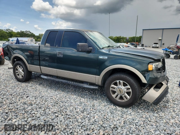 2004 Ford F-150 XL with VIN 1FTPX12564NA87792, listed as a Copart auction lot 60489655 with 396,269 mi miles and Salvage title. Bid and sale history available at DreamBid. Image 4.