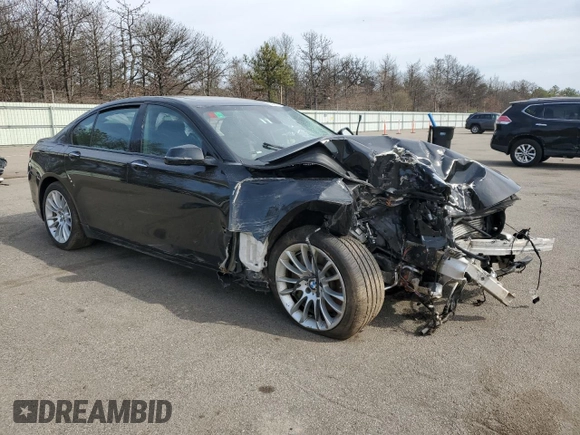 2015 BMW 7 Series 750i xDrive with VIN WBAYB6C59FD965994, listed as a Copart auction lot 53994545 with 119,929 mi miles and Salvage Title. Bid and sale history available at carsss.com. Image 4.