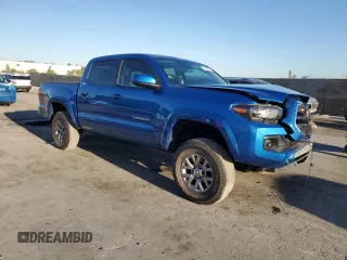 2018 Toyota Tacoma SR5 with VIN 5TFAZ5CN3JX058160, listed as a Copart auction lot 49823895 with 107,247 mi miles and Salvage Title. Bid and sale history available at DreamBid. Image 4.
