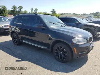 2012 BMW X5 35i with VIN 5UXZV4C54CL752079, listed as a Copart auction lot 62147515 with 147,244 mi miles and Clean title. Bid and sale history available at DreamBid. Image 4.