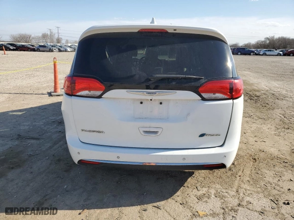 2018 Chrysler Pacifica Hybrid Touring Plus with VIN 2C4RC1H71JR159333, listed as a Copart auction lot 49529185 with 0 mi miles and Salvage Title. Bid and sale history available at carsss.com. Image 6.