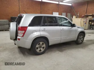 2012 Suzuki Grand Vitara Premium z VIN JS3TD0D2XC4100425, wystawiony jako Copart lot #49080815 z przebiegiem 108 780 mil mil oraz Szkody całkowita. Historia ofert i sprzedaży dostępna na DreamBid. Obrazek 3.
