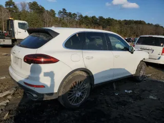 2016 Porsche Cayenne with VIN WP1AA2A29GKA13338, listed as a Copart auction lot 42319275 with 122,980 mi miles and Salvage Title. Bid and sale history available at carsss.com. Image 3.