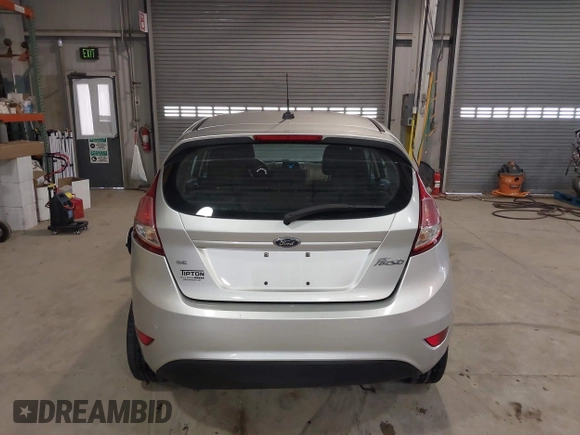 2016 Ford Fiesta SE with VIN 3FADP4EJ9GM197205, listed as a IAAI auction lot 41815313 with 115,689 mi miles. Bid and sale history available at carsss.com. Image 16.