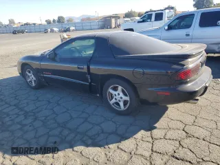 1999 Pontiac Firebird Firebird z VIN 2G2FS22K6X2208489, wystawiony jako Copart lot #79930994 z przebiegiem 181 964 mil mil oraz Czysty tytuł • Clean title. Historia ofert i sprzedaży dostępna na DreamBid. Obrazek 2.