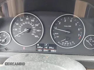 2015 BMW 3 Series 320i xDrive with VIN WBA3C3C55FP664465, listed as a IAAI auction lot 41608096 with 67,911 mi miles and . Bid and sale history available at DreamBid. Image 7.
