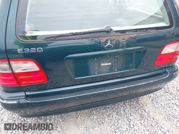 2002 Mercedes-Benz E-Class with VIN WDBJH65J12B462834, listed as a IAAI auction lot 42086848 with 190,720 mi miles. Bid and sale history available at carsss.com. Image 6.