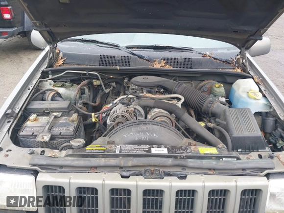 1998 Jeep Grand Cherokee Limited z VIN 1J4GZ78Y5WC261391, wystawiony jako IAAI lot #42275913 z przebiegiem 180 552 mil mil oraz . Historia ofert i sprzedaży dostępna na DreamBid. Obrazek 10.