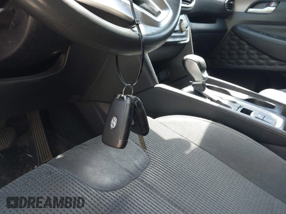 2019 Hyundai Santa Fe SE with VIN 5NMS23AD3KH083786, listed as a IAAI auction lot 42196828 with Not Provided miles and . Bid and sale history available at DreamBid. Image 11.