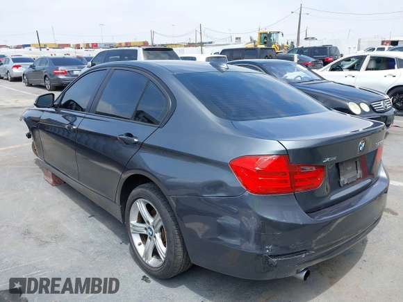 2014 BMW 3 Series 320i xDrive with VIN WBA3C3C58EP661414, listed as a IAAI auction lot 42489010 with 93,488 mi miles and . Bid and sale history available at DreamBid. Image 3.