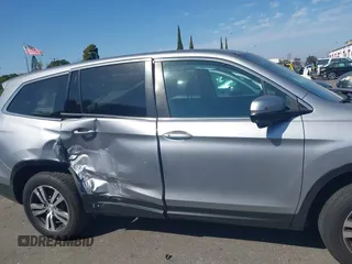 2016 Honda Pilot EX with VIN 5FNYF5H33GB033082, listed as a IAAI auction lot 41699662 with 98,799 mi miles. Bid and sale history available at carsss.com. Image 13.