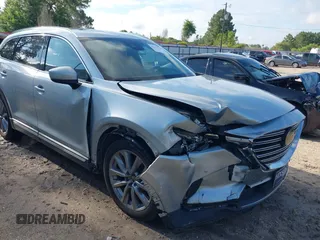 2020 Mazda CX-9 Grand Touring with VIN JM3TCADY2L0406173, listed as a IAAI auction lot 42217230 with 110,465 mi miles and . Bid and sale history available at DreamBid. Image 6.