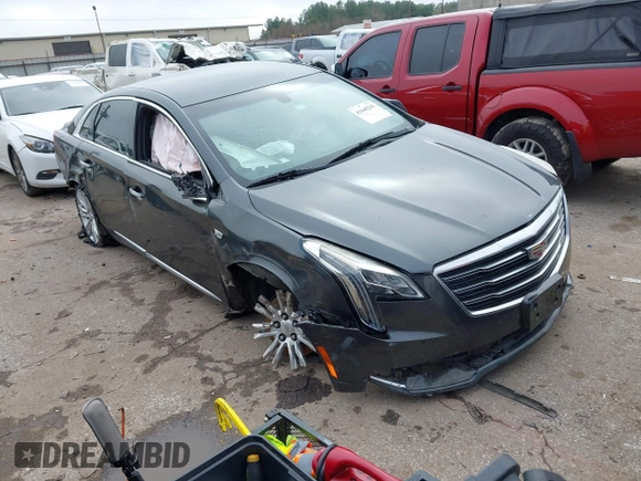2018 Cadillac XTS Luxury with VIN 2G61M5S30J9164758, listed as a IAAI auction lot 41648265 with 173,134 mi miles and . Bid and sale history available at carsss.com. Image 1.